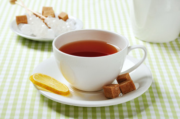 Cup with tea and lemon