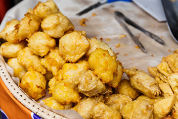 Fried chicken pieces on the street market in Thailand