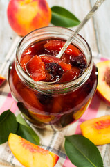 Peach jam with fresh fruits