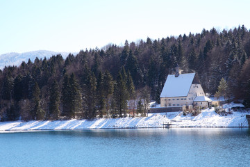 An image of the Walchensee in Bavaria Germany covered in snow