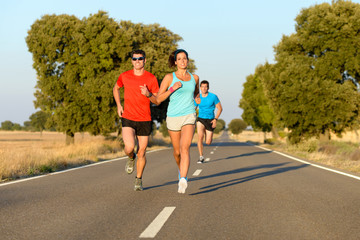 Sport people running in road