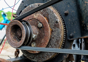 Old pulley and belt of the lawnmower