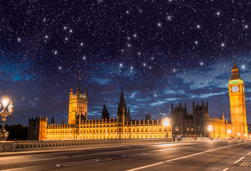 London. Houses of Parliament and Westminster Bridge at night wit