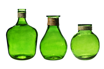 Three vintage bottles isolated on white.