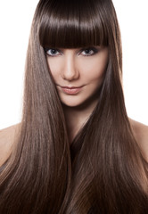Naklejka premium Portret piękna brunetki kobieta z długim prostym włosy