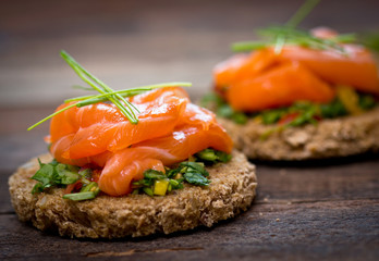 Canapes with smoked salmon and herbs