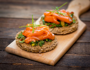 Canapes with smoked salmon and herbs