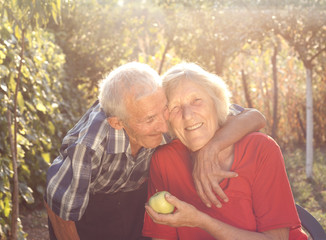 portrait of senior couple in the garden