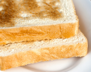 Toast on a white background, close-up