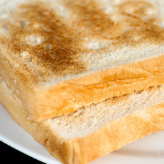 Toast on a white background, close-up