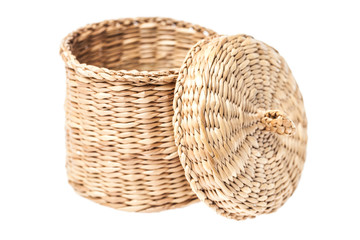 Light brown wicker basket with open lid, isolated on white bac