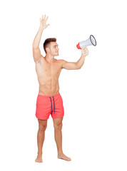 Handsome lifeguard with red swimsuit and megaphone