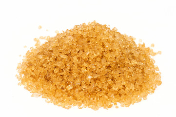 Cane sugar on white background .