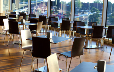 tables set for meal in food center