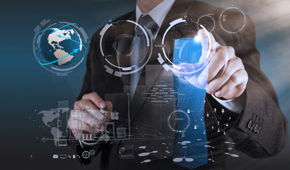 businessman hand drawing a pie chart