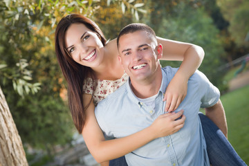 Mixed Race Romantic Couple Portrait in the Park