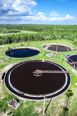 Industrial wastewater treatment plant in evergreen forest