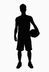 Silhouette of basketball player holding ball.