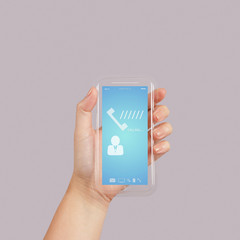 hand holding a touch phone with blue screen and the phone ringin