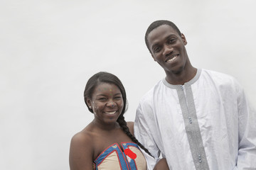 Obraz premium Portrait of young couple in traditional African clothing, studio shot 