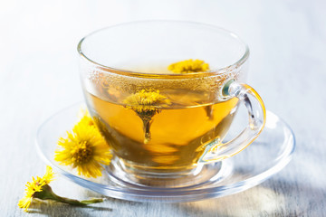 herbal tea with coltsfoot flowers