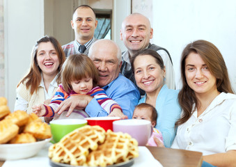 Fototapeta premium large joyful three generations family