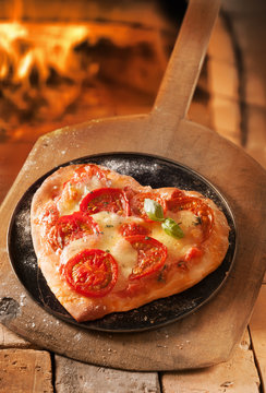 Heart shaped Italian pizza