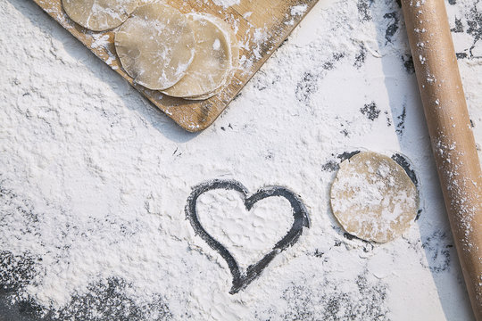 Chinese dumpling making, heart in the flour