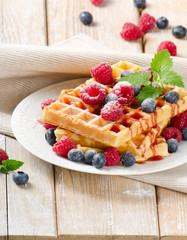 waffles with blueberries and raspberries.