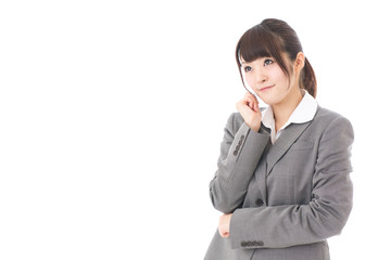 young businesswoman thinking on white background