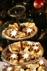 Christmas cookies on holiday plates.