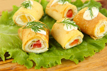 Egg rolls with cheese cream and paprika,