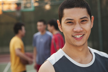 Friends on the basketball court, portrait