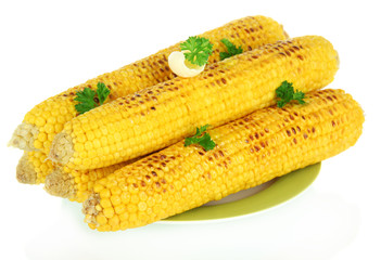 Delicious golden grilled corn with butter isolated on white