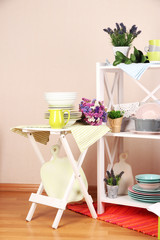 Beautiful white furniture with tableware and decor,