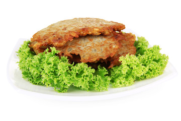 Potato pancakes on plate, isolated on white