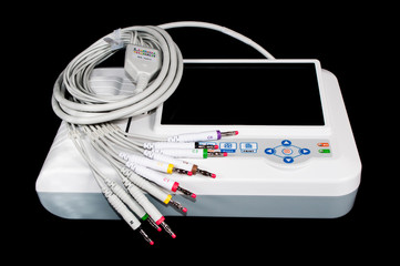 ECG machine isolated on black.