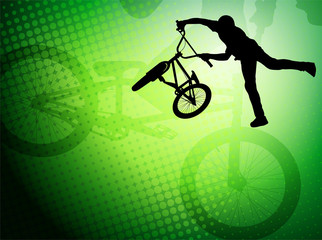 Fototapeta na wymiar bmx stunt cyclist silhouette on the abstract background - vector