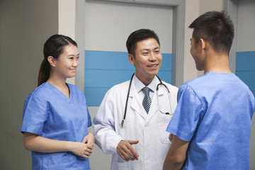 Medical Team Talking In Hospital