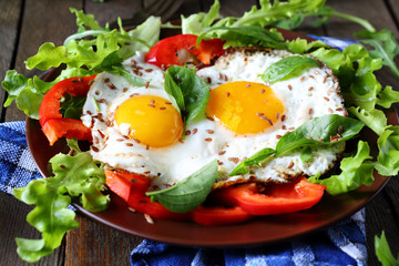 eggs with fresh vegetables on the plate