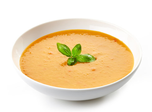 bowl of squash soup with basil