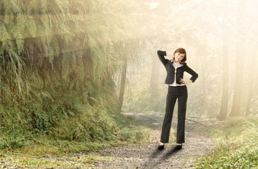 Business woman relax in forest