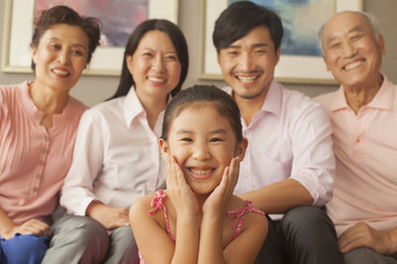 Multigenerational family smiling, portrait