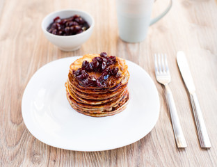 Delicious pancakes with cherry jam