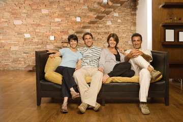 Obraz premium Grown up family on the sofa