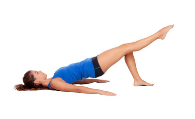 Attractive woman doing pilates exercises