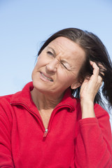 Worried concerned mature woman