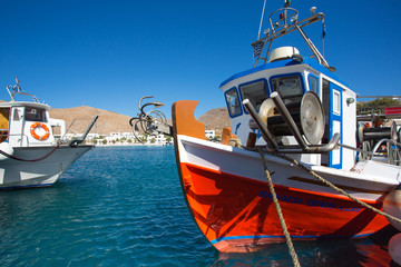 Fototapeta na wymiar Little fishers boats on the aegean sea