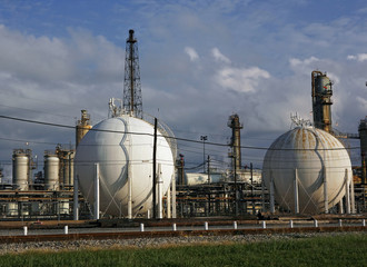 Old rusty industrial chemical tanks