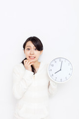 時計を持った女性